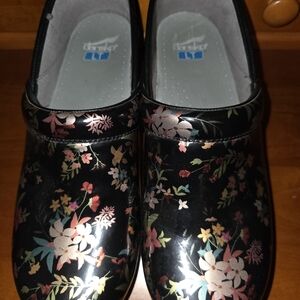 Dansko Black Floral Patent Slip-On Clogs - Padded Footbed